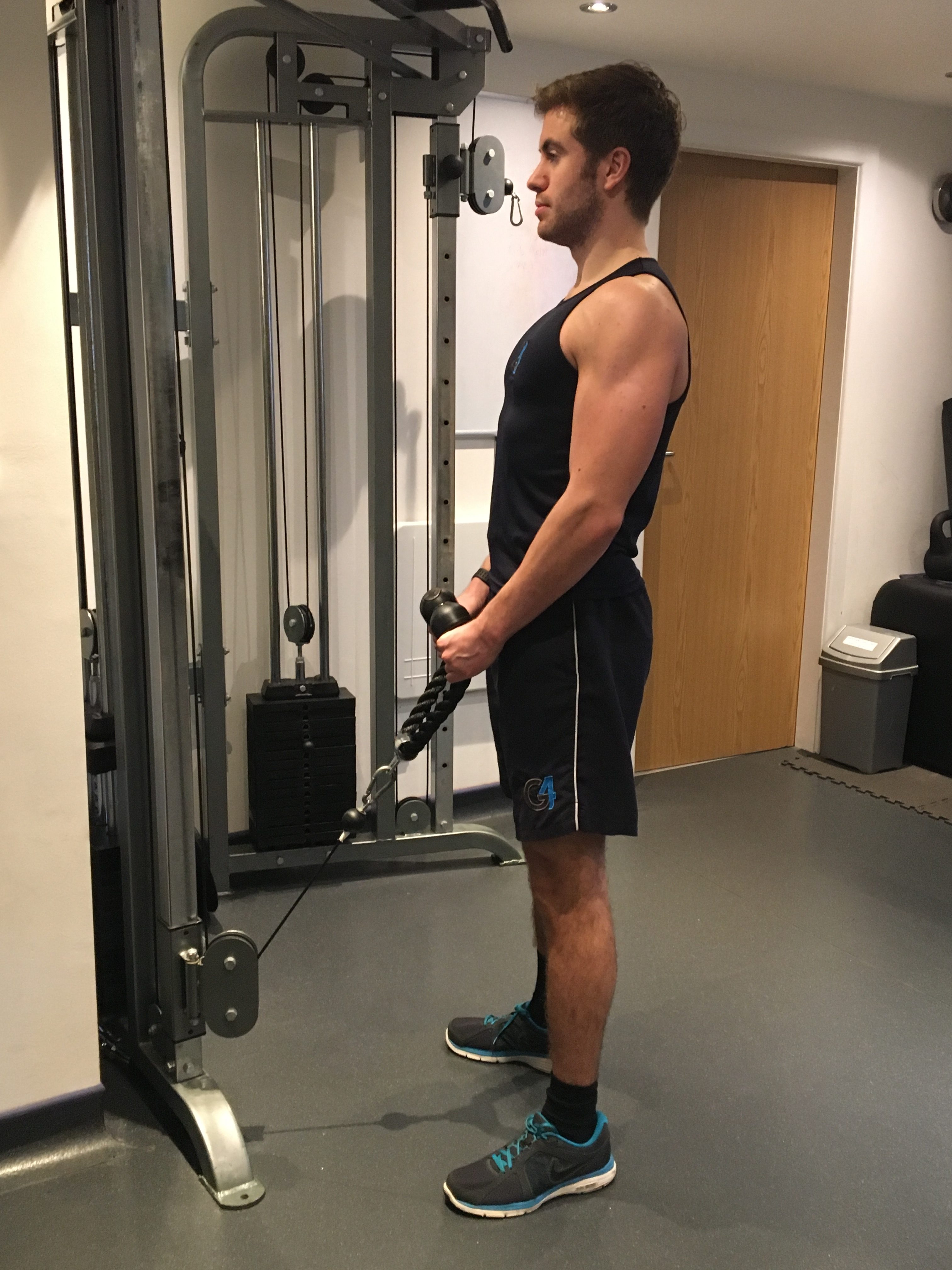Standing Bicep Curl - G4 Physiotherapy & Fitness